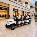 White MXV Sovereign 8 Taxi Edition in a shopping mall