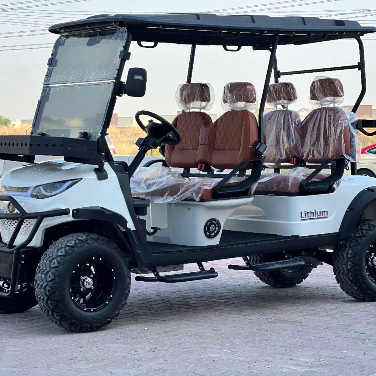 MXV Voyager 4 Trail lifted golf cart rear three-quarter view